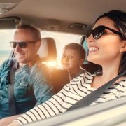 Happy Family Driving The Car