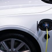 Hybrid car at charging station